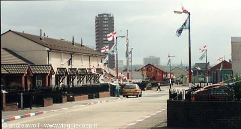 Belfast, protestant Shankill area. Note the pavements and the unionist flags