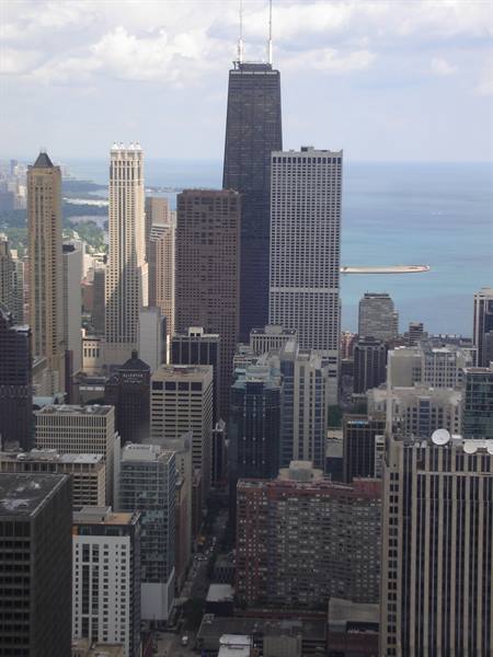 The John Hancock Center in Chicago towers over skyscrapers facing Lake Michigan