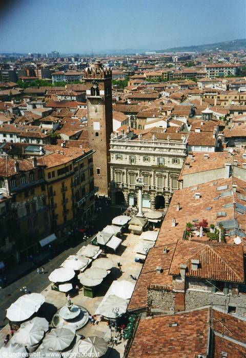 Piazza delle Erbe in Verona with Lamberti tower among red rooftops