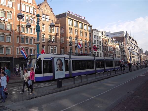 The Damrak, Amsterdam's main street with the ever-present tram