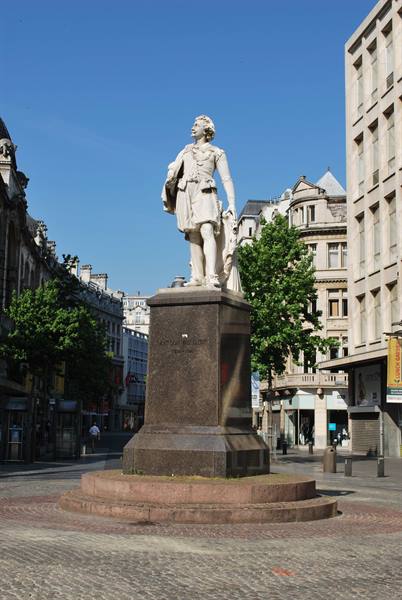 Marble statue of Rubens on granite pedestal in a square, Antwerp