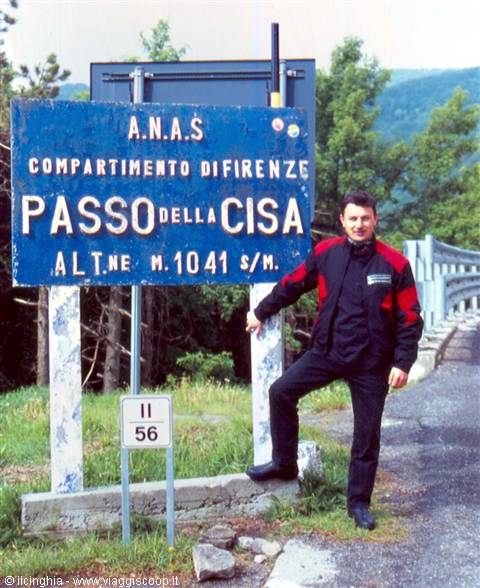 Passo della Cisa: man in red and black jacket beside the A.N.A.S. road sign