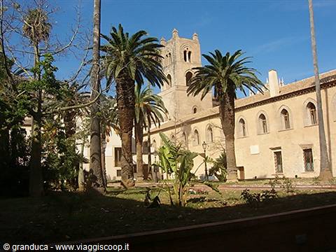 Palms and Arab-Norman bell tower in a Palermo garden