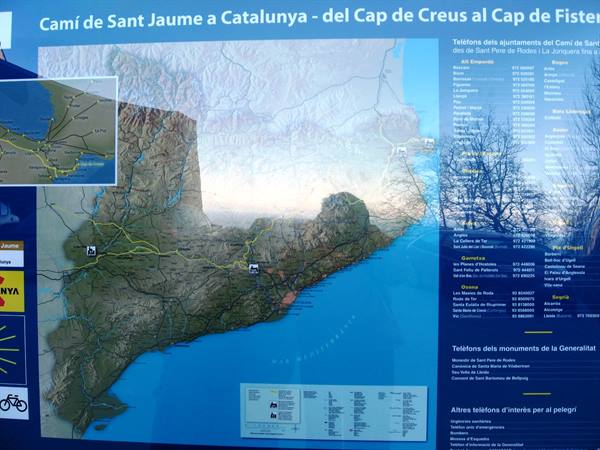 Information board with map of the Camí de Sant Jaume in Catalonia, light reflections