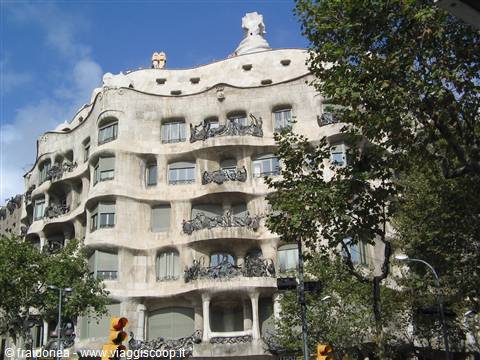 Wavy stone facade with wrought-iron balconies, Casa Milà in Barcelona