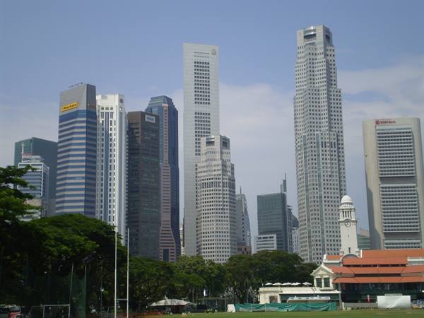 Singapore financial district skyscrapers above the Padang cricket field