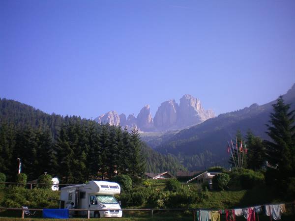 Camper van parked below the Sassolungo peaks, Val Gardena