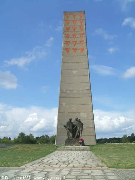 Huge concrete obelisk with soldier statues at its base, Sachsenhausen