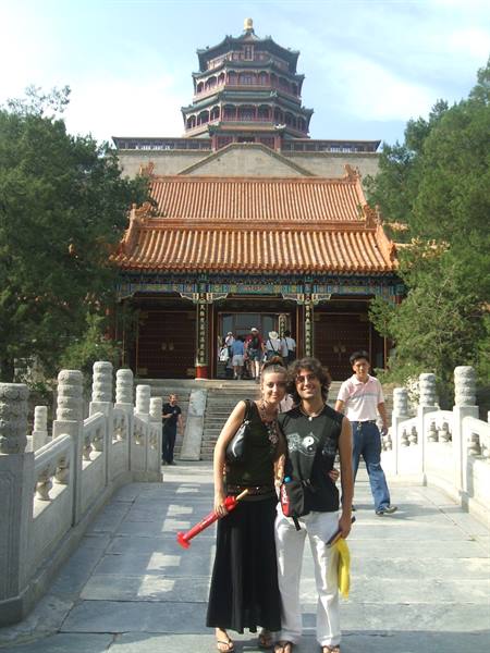 Tourists on a marble bridge in front of the Tower of Buddhist Incense, Summer Palace