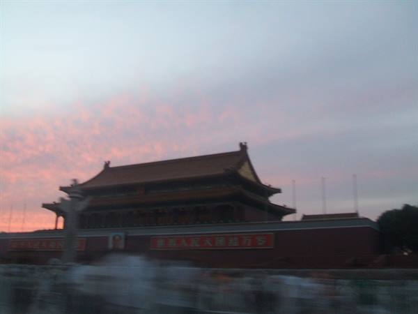 Tiananmen Gate in Beijing, red walls and pink dusk sky