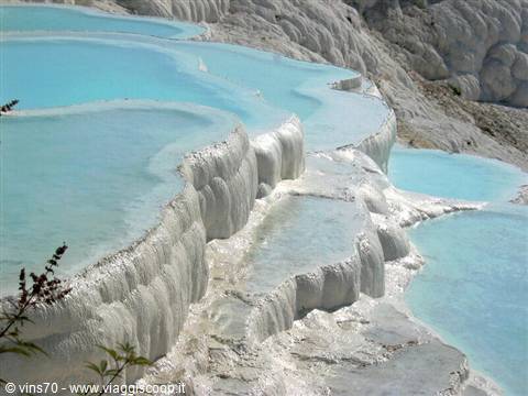 White travertine terraces with turquoise pools at Pamukkale