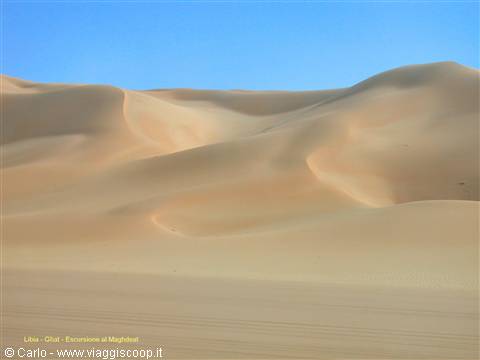 Golden sand dunes in the Ubari desert, Gaberoun, bright morning light