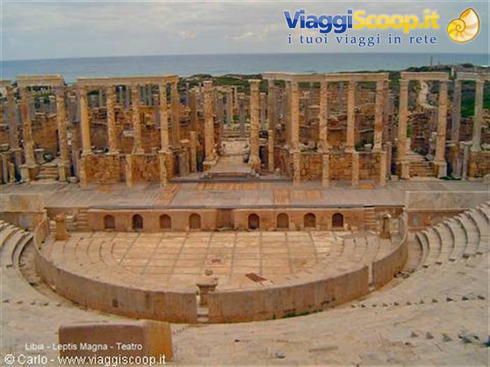 Roman theatre of Leptis Magna, stone seats and columns by the sea