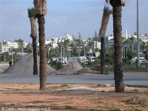 Palms and sand piles on Tripoli Green Square