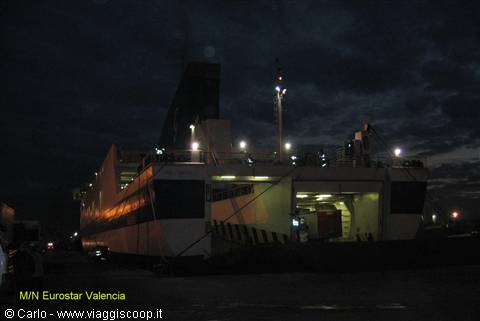 Eurostar Valencia ferry in port at night, lights glowing on deck