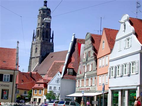 St. George's Gothic tower rising above Nördlingen's colorful old town houses