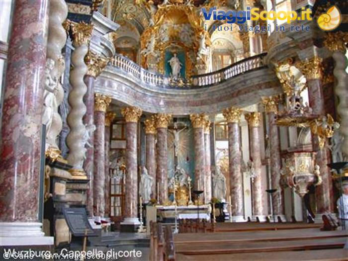 Baroque interior of Dresden Hofkirche: marble columns, golden altar, statues