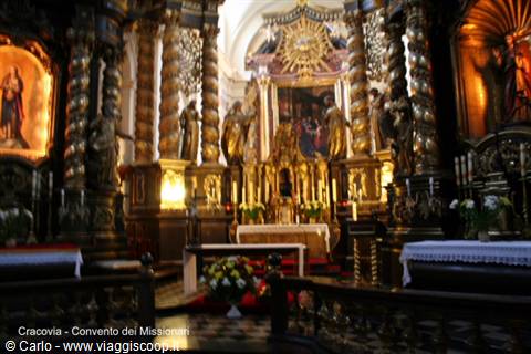 Gilded high altar with twisted columns inside the Missionaries' Convent church in Kraków