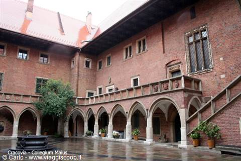 Collegium Maius courtyard in Kraków, brick arches with loggia and staircase