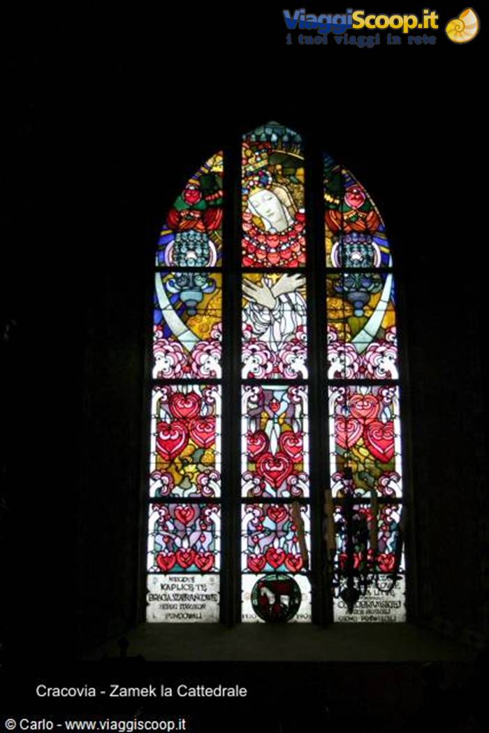 Stained glass window with Madonna and red hearts in Kraków cathedral