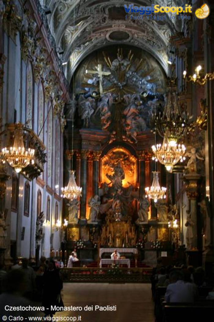 Gilded baroque altar with crystal chandeliers inside the Pauline Monastery church in Częstochowa