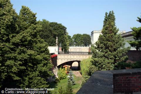 Brick bridge among trees at Jasna Góra monastery, Częstochowa
