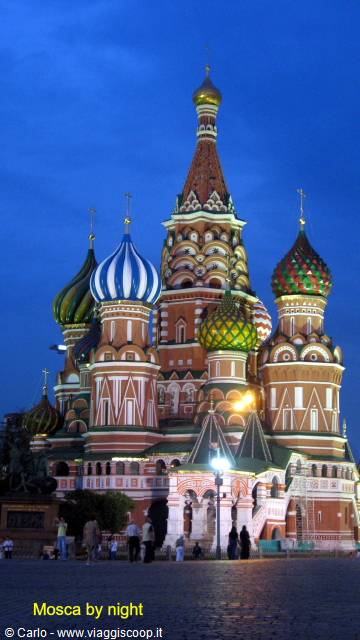 St Basil's Cathedral illuminated at night in Moscow, colorful domes glowing