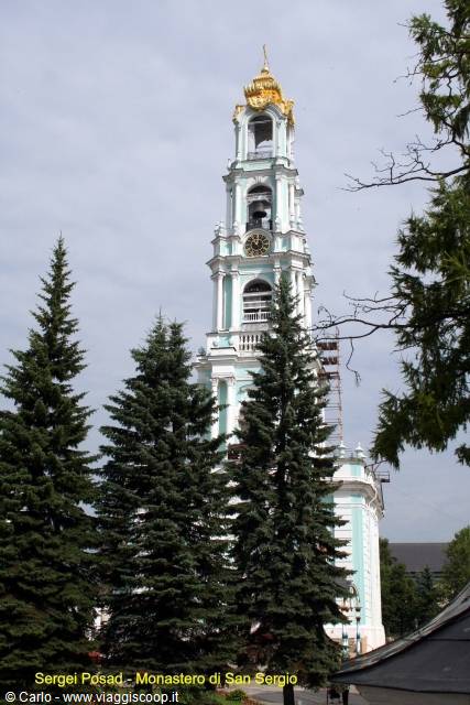 Sergiev Posad: blue bell tower of St Sergius monastery among firs