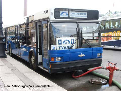 Blue bus in Saint Petersburg converted into public toilets, red hose at hydrant