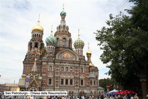 Church of the Savior on Spilled Blood in Saint Petersburg, tiled domes under cloudy sky