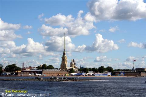 Peter and Paul Fortress across the Neva River under white clouds, Saint Petersburg