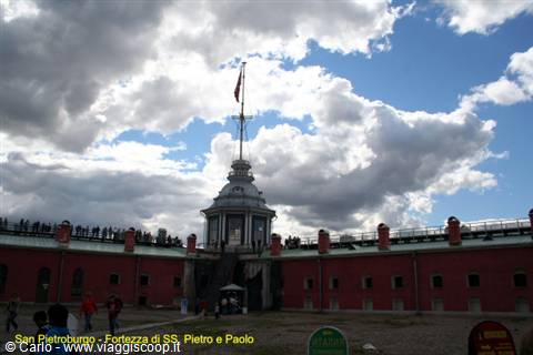 Flag tower above red fortress walls, Peter and Paul Fortress, Saint Petersburg