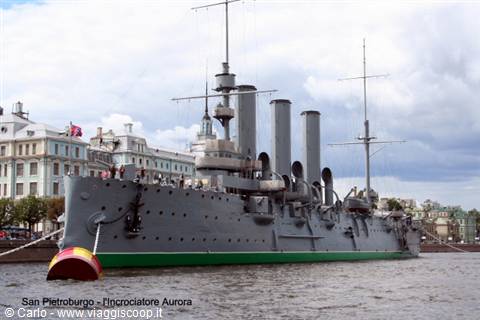 Aurora cruiser moored on the Neva River in Saint Petersburg, cloudy sky