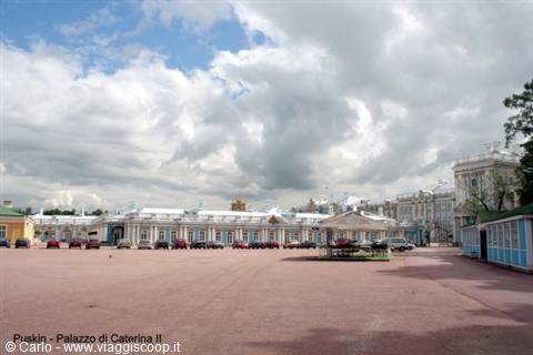 Catherine Palace in Pushkin, blue and white facade under heavy clouds