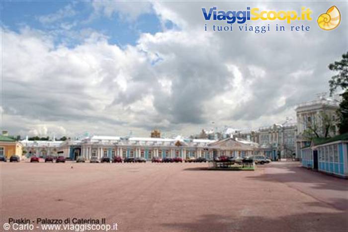 Catherine Palace in Pushkin, blue and white facade under heavy clouds