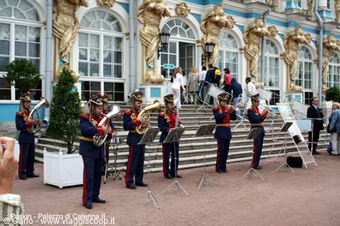 Military brass band performing in front of the Catherine Palace baroque facade, Pushkin