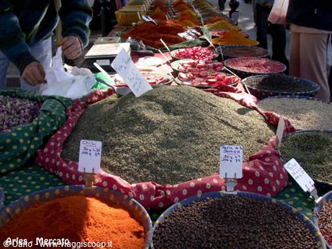 Colorful spice stalls at the Arles market, in Camargue