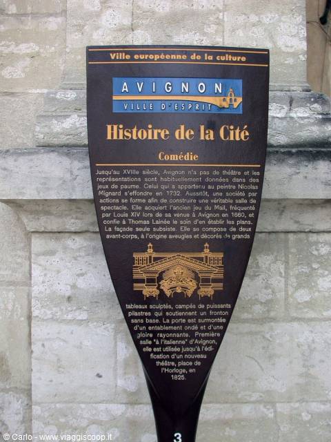 Brown and gold historical plaque on stone wall, Avignon, Histoire de la Cité
