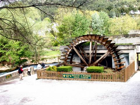 large wooden water wheel at the Moulin à Papier, Fontaine-de-Vaucluse