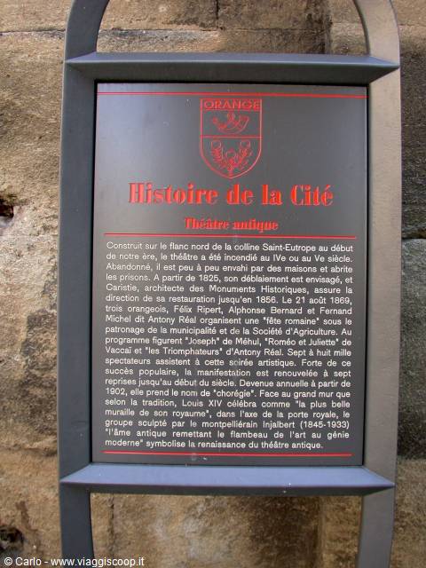 Historical plaque of the ancient Roman theater of Orange on stone wall