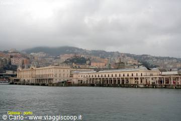 Genoa's Stazione Marittima faces the harbor under a grey sky