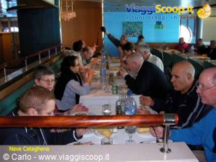 Group of people having lunch in the Nav Glovera ferry dining room