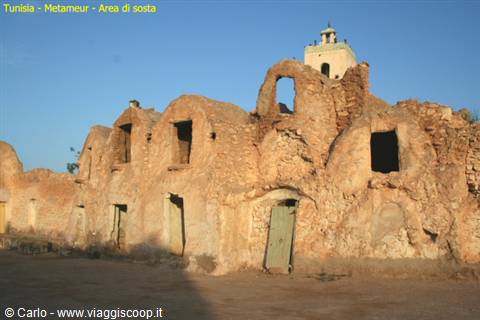 Metameur ksar, mud-brick granaries with minaret, golden morning light