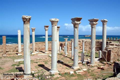 Marble columns of the Byzantine Basilica of Apollonia standing before the blue sea