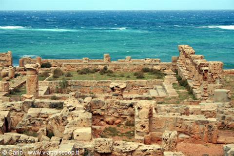 Ancient stone ruins of Apollonia with columns facing the sea