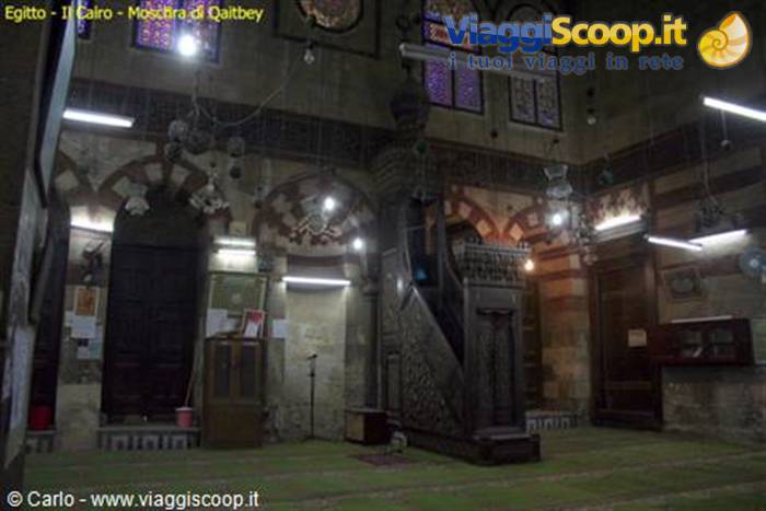 Carved wooden minbar inside Qaitbay Mosque, Cairo, soft lighting