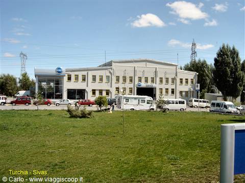 Sivas bus station, white buildings with buses and campers parked outside