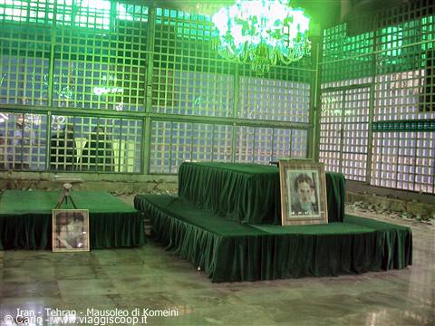 Green-draped tomb with portraits inside Khomeini Mausoleum, Tehran