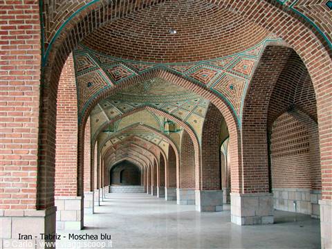 Brick arcades with turquoise tiles inside Tabriz Blue Mosque