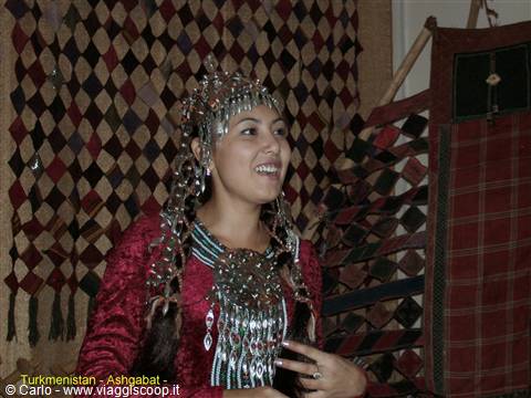 Woman in traditional Turkmen dress with silver jewelry, Ashgabat